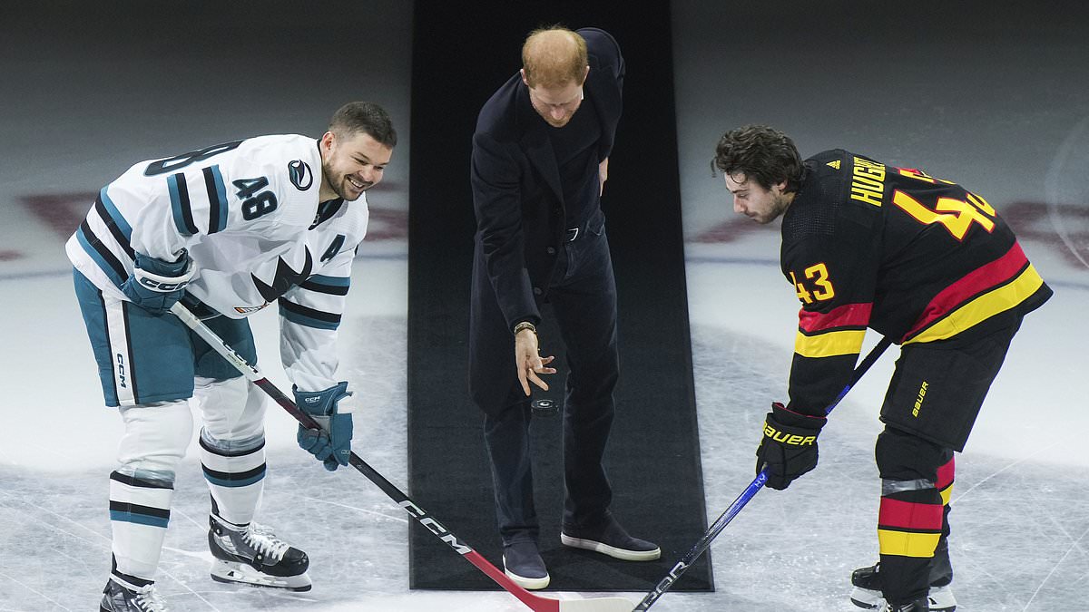 Prince Harry walks in late Queen&apos;s steps as he drops puck at hockey