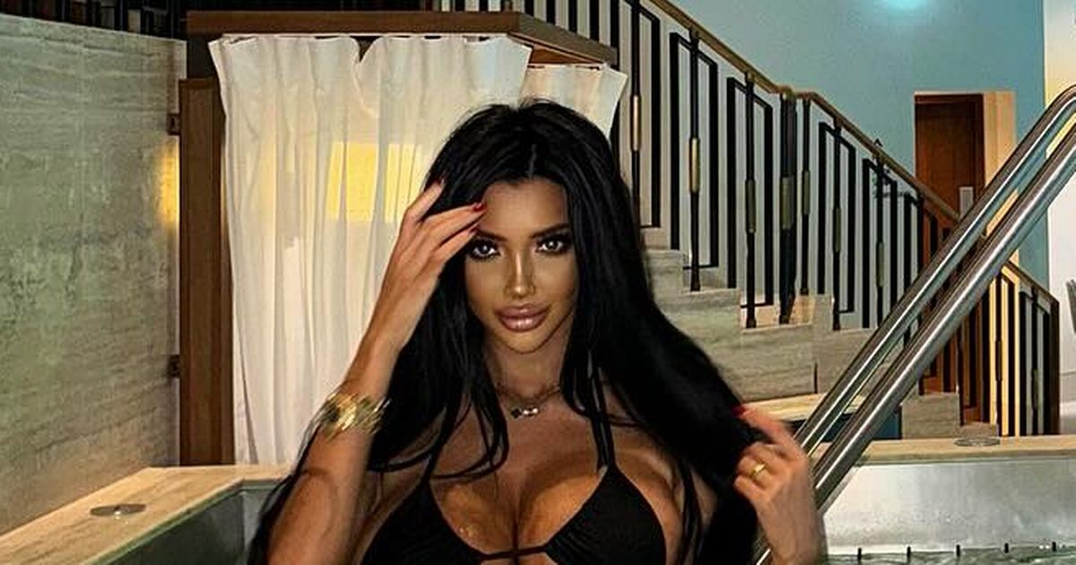 Chloe Khan distracts fans with world’s biggest boobs as she strips to bikini